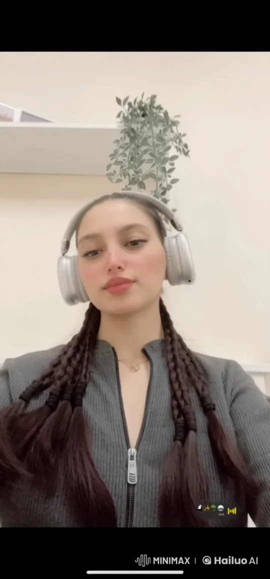 Young Person in Tranquil Room with Headphones and Cigarette – AI Generated Video | Hailuo AI