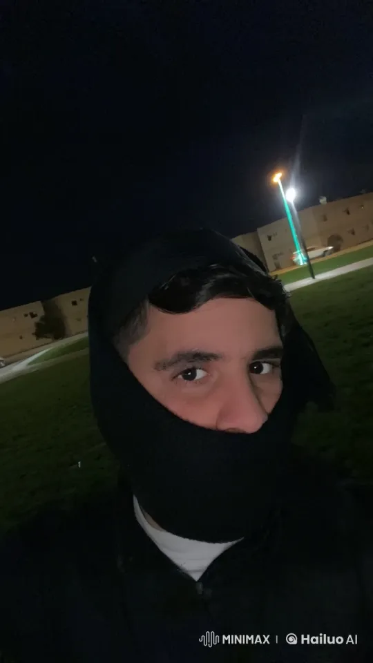 Nighttime Park Scene: Person Smoking Calmly – AI Generated Video | Hailuo AI