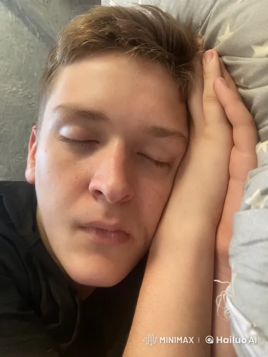 Young Man Awakens with Playful Kiss Imagery – AI Generated Video | Hailuo AI