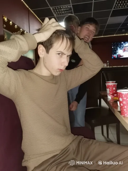Young Man Shaves Head in Festive, Dimly Lit Room – AI Generated Video | Hailuo AI