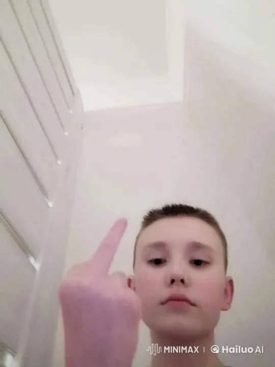 Defiant Gesture in Bright, Minimalist Setting – AI Generated Video | Hailuo AI