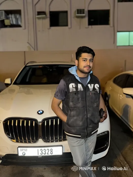 Young Man Dancing Casually by BMW in Dim Light – AI Generated Video | Hailuo AI