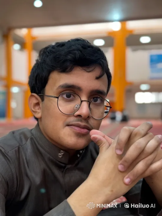Young Man Contemplates in Calm, Lit Room Smoking – AI Generated Video | Hailuo AI