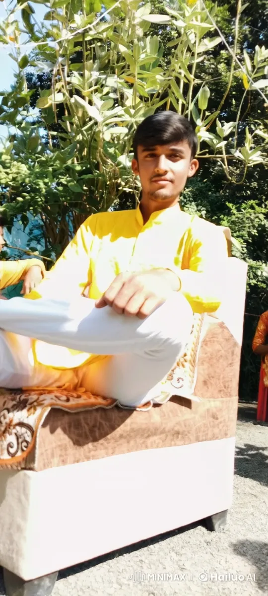 Young Man Relaxing in Bright Outdoor Setting – AI Generated Video | Hailuo AI