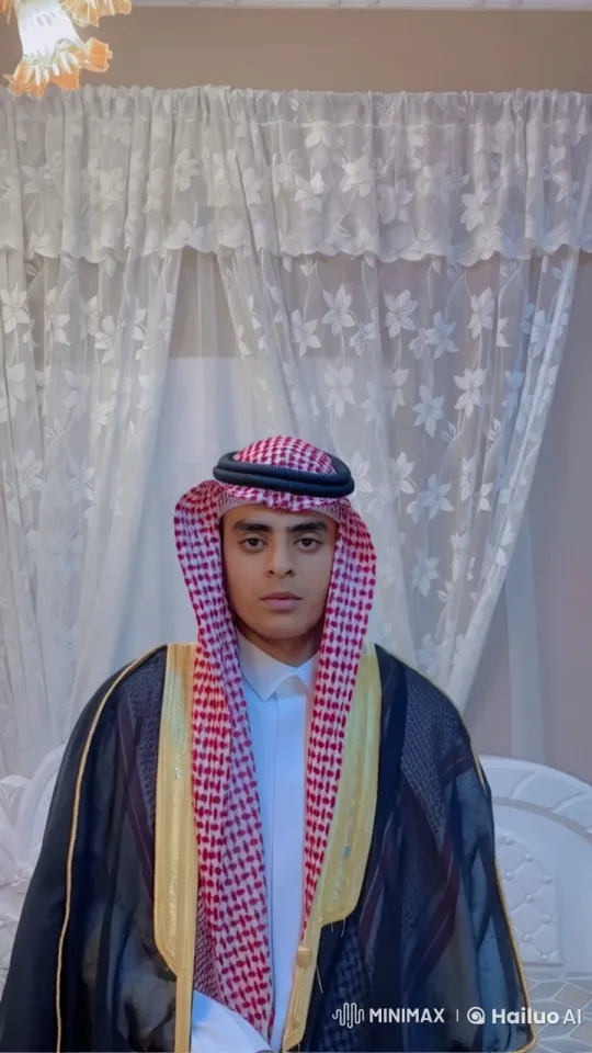 Man in Traditional Attire Smokes in Serene Setting – AI Generated Video | Hailuo AI