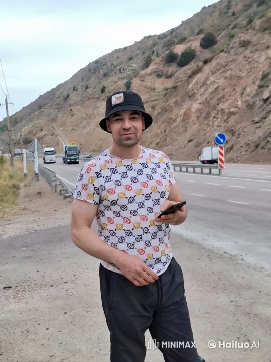 Eagle Gently Lands on Man's Shoulder in Mountainous Setting – AI Generated Video | Hailuo AI