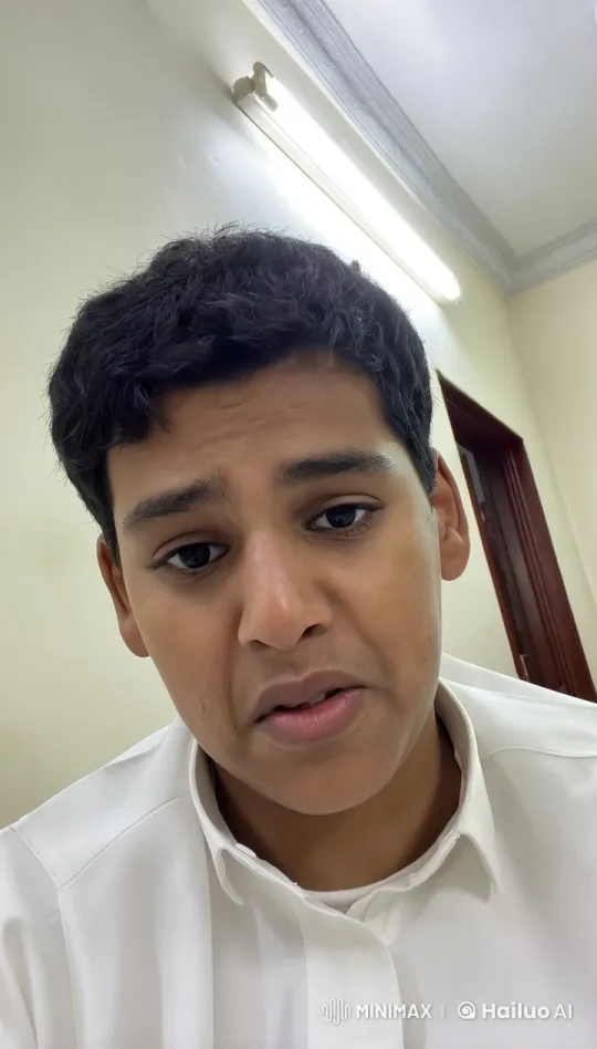 Young Man Smoking Cigarette in Dimly Lit Room – AI Generated Video | Hailuo AI