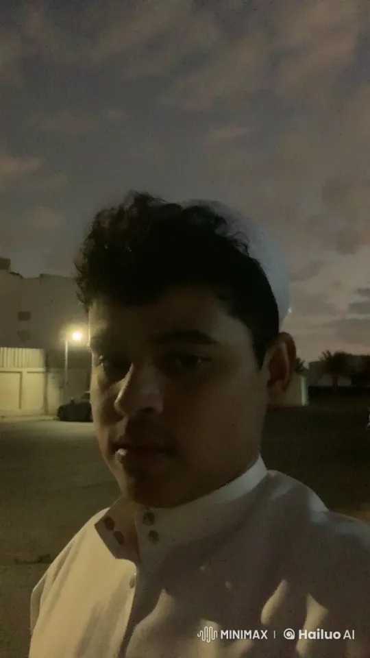Nighttime Smoker in Traditional Attire Reflects Quietly – AI Generated Video | Hailuo AI