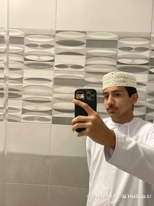 Young Man Smoking in Modern Bathroom Setting – AI Generated Video | Hailuo AI