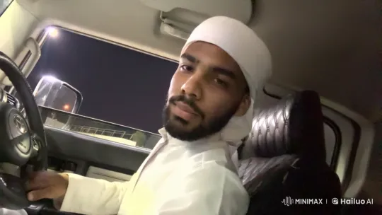 Nighttime Drive: Man Lights Cigarette in Silence – AI Generated Video | Hailuo AI