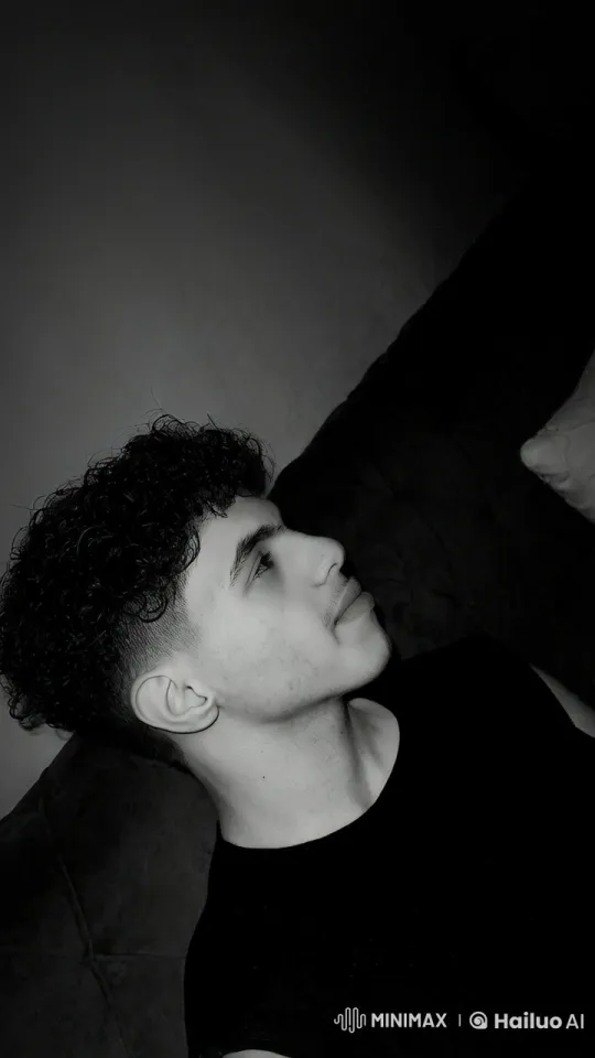 Contemplative Smoking Scene in Monochrome Ambiance – AI Generated Video | Hailuo AI