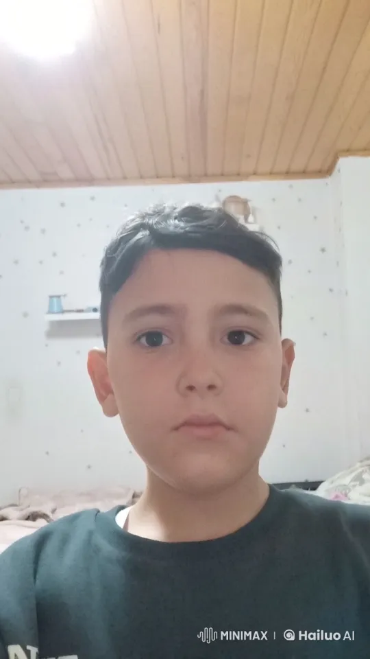 Child Enjoying Warm Beverage in Cozy Bedroom – AI Generated Video | Hailuo AI