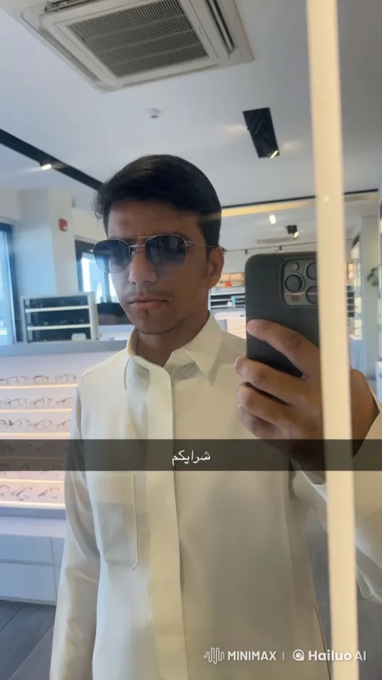 Man Taking Selfie in Modern Eyeglasses Store – AI Generated Video | Hailuo AI