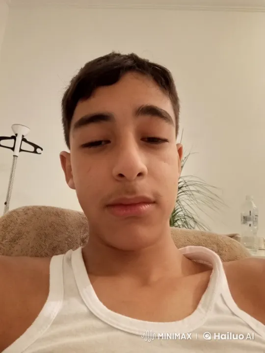 Comfortable Person Smoking in a Softly Lit Room – AI Generated Video | Hailuo AI