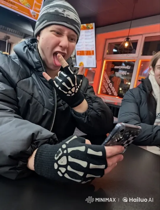 Live2D Animation: Cozy Diner Scene with Smartphone User – AI Generated Video | Hailuo AI