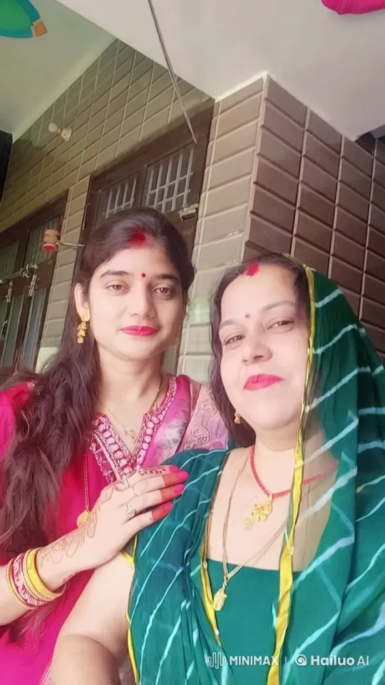Traditional Attired Women Share Affectionate Embrace – AI Generated Video | Hailuo AI