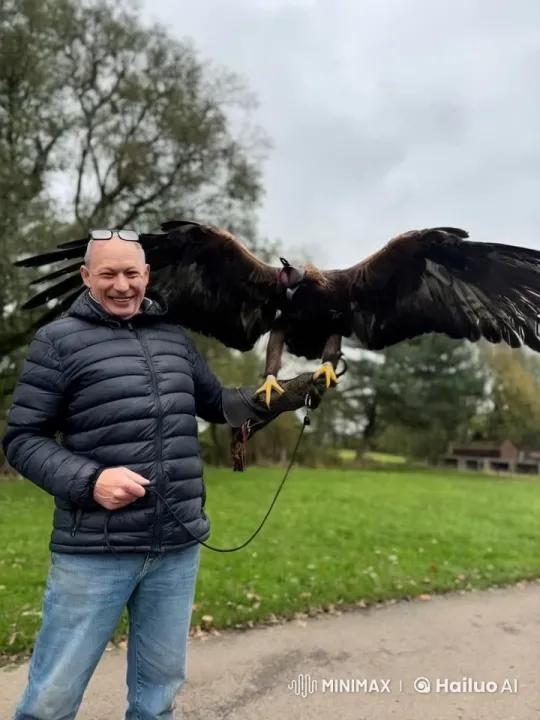 Man and Falcon in Nature's Beauty – AI Generated Video | Hailuo AI