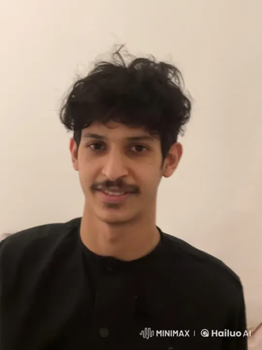 Young Man Smoking Calmly in a Serene Room – AI Generated Video | Hailuo AI