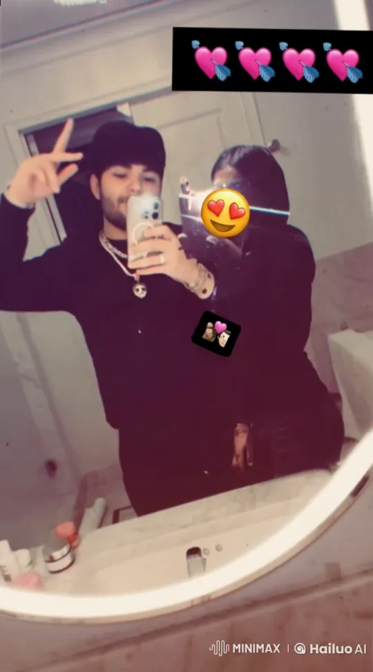 Couple's Romantic Mirror Selfie and Embrace in Modern Bathroom – AI Generated Video | Hailuo AI