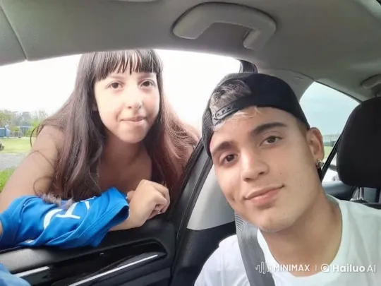Affectionate Moment Between Boy and Girl in Car – AI Generated Video | Hailuo AI