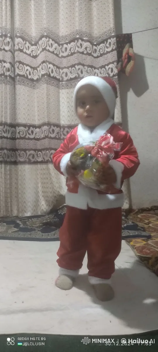 Child in Santa Suit Showcases Gifts in Festive Room – AI Generated Video | Hailuo AI