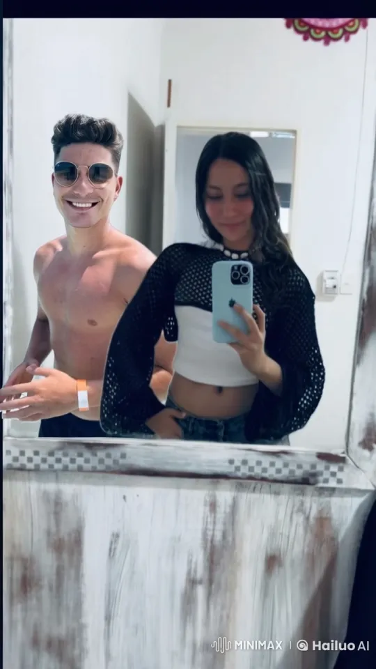 Young Couple Reflects Intimacy in Mirror Selfie – AI Generated Video | Hailuo AI