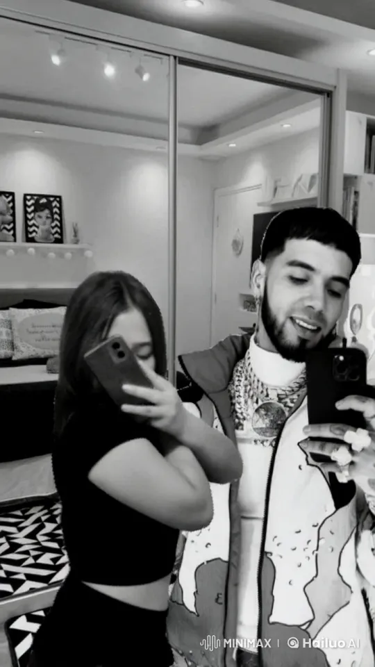 Affectionate Couple Shares Tender Moment in Modern Bedroom – AI Generated Video | Hailuo AI