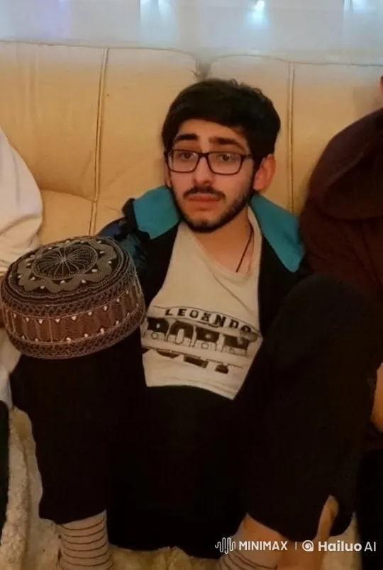 Young Person Relaxing on Couch with Decorative Hat – AI Generated Video | Hailuo AI