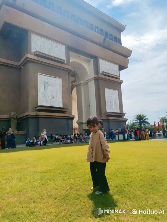 Child Explores Meadow in Front of Grand Building – AI Generated Video | Hailuo AI