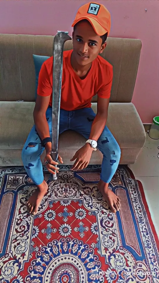 Live2D Animation of Person with Metallic Object on Vibrant Carpet – AI Generated Video | Hailuo AI