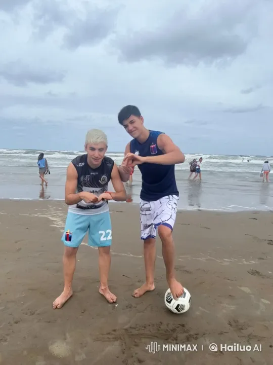 Beach Friendship: Playful Hand Kiss Moment – AI Generated Video | Hailuo AI