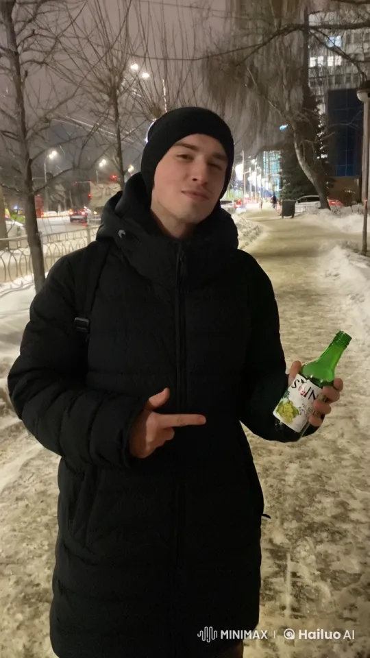 Person's Skin Turns Black, Drinks from Green Bottle on Snowy Sidewalk – AI Generated Video | Hailuo AI