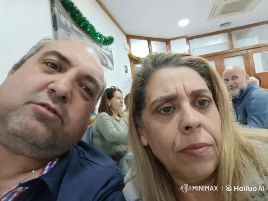 Couple Shares Tender Kiss at Festive Gathering – AI Generated Video | Hailuo AI