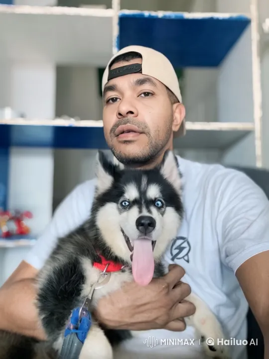 Man Bonds with Smiling Husky Puppy – AI Generated Video | Hailuo AI