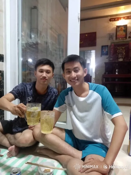 Two Friends Celebrate Over Beer Indoors – AI Generated Video | Hailuo AI