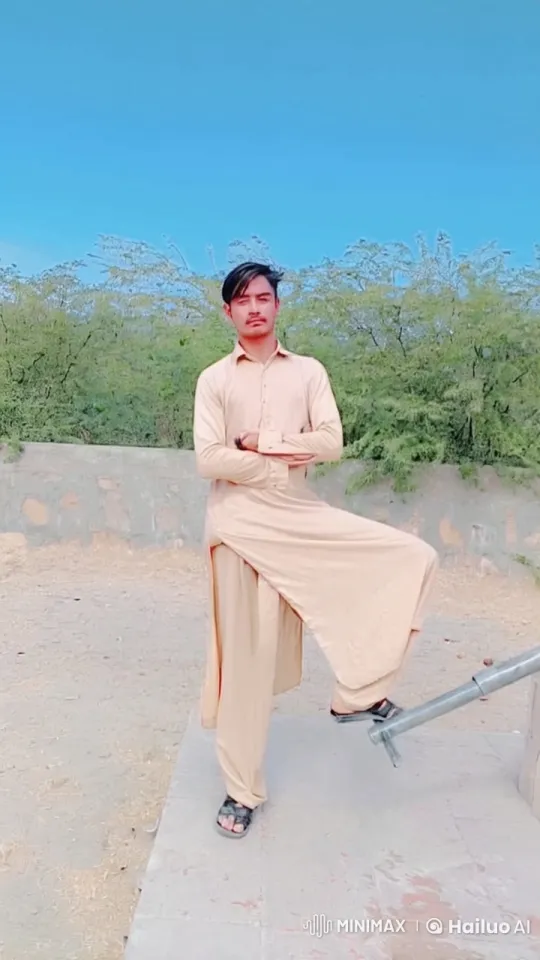Traditional Man Poses in Futuristic Smoggy Landscape – AI Generated Video | Hailuo AI