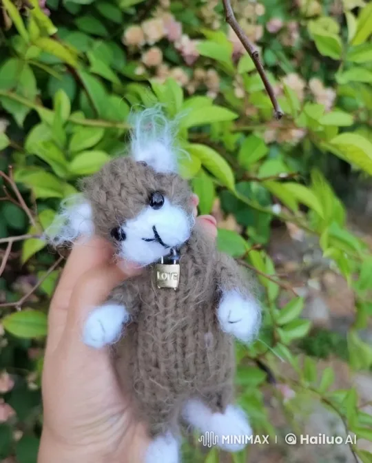 Hand-Knitted Plush Toy in Peaceful Outdoor Setting – AI Generated Video | Hailuo AI