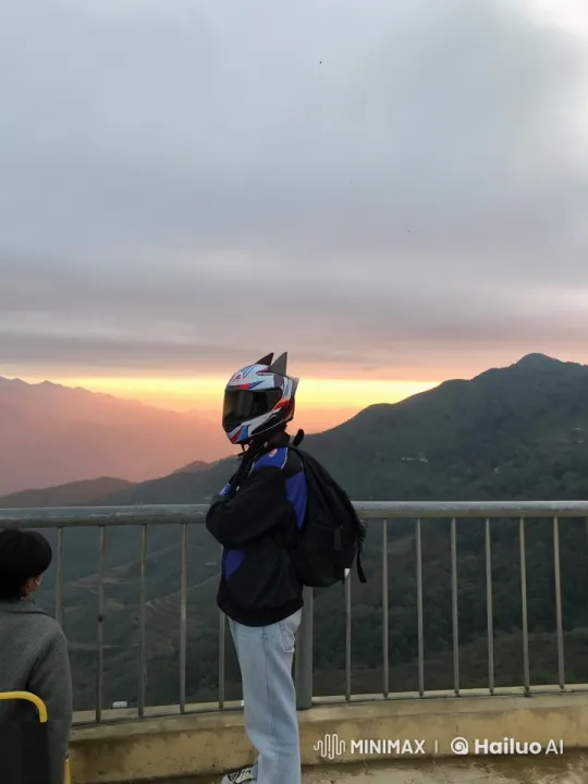 Motorcyclist Enjoying a Serene Sunset Over Clouds – AI Generated Video | Hailuo AI
