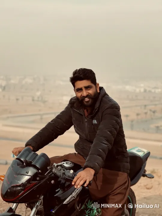 Man on Motorcycle at Hilltop with Desert Landscape – AI Generated Video | Hailuo AI