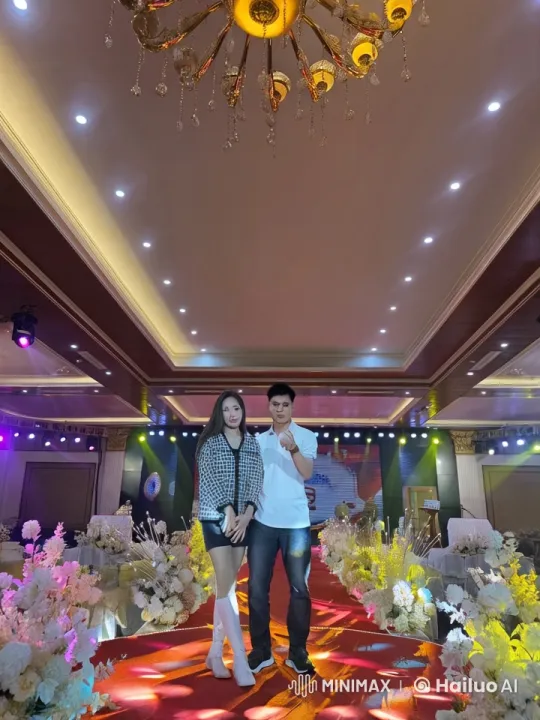 Couple Demonstrates Martial Arts Prowess on Red Carpet Stage – AI Generated Video | Hailuo AI