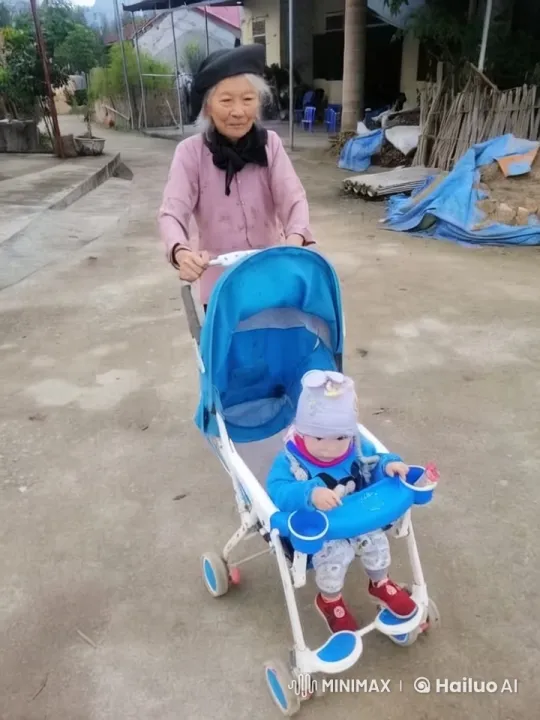 Elderly Woman Gently Pushes Toddler in Stroller – AI Generated Video | Hailuo AI