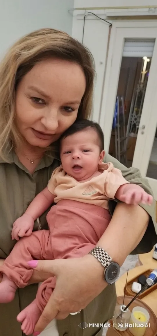 Casual Duo with Baby in Sakura-Filled Indoor Setting – AI Generated Video | Hailuo AI