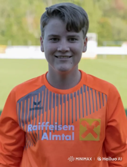 Young Athlete in Orange Jersey on Soccer Field – AI Generated Video | Hailuo AI