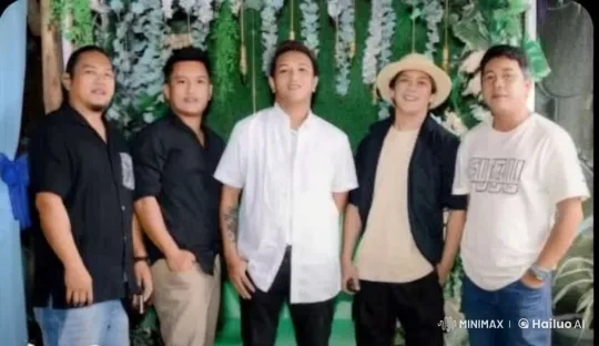 Five Men Enjoy Playful Fight in Lush Setting – AI Generated Video | Hailuo AI