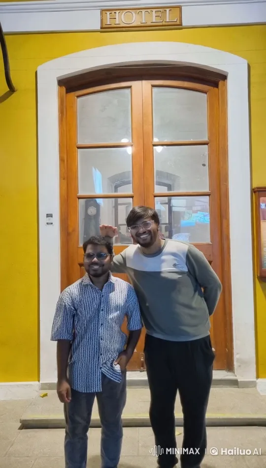 Intimate Affectionate Moment Between Two Men Outside Hotel – AI Generated Video | Hailuo AI