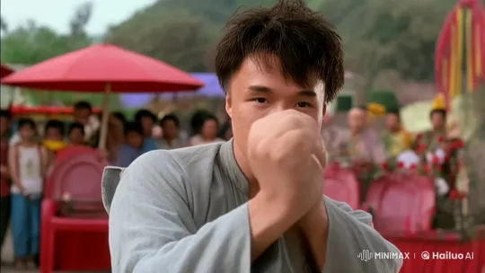 Young Man Demonstrates Impressive Kung Fu Skills in Festive Outdoor Setting – AI Generated Video | Hailuo AI