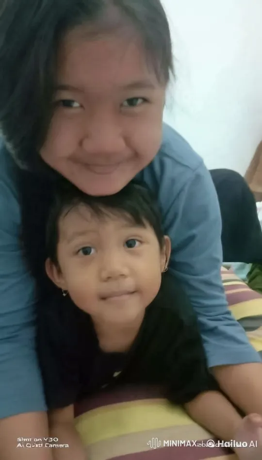 Joyful Children Play on Bed with Striped Blankets – AI Generated Video | Hailuo AI
