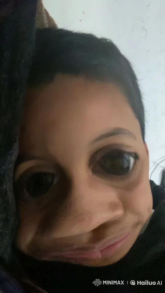 Close-up of a Person Resting with Gentle Movements – AI Generated Video | Hailuo AI