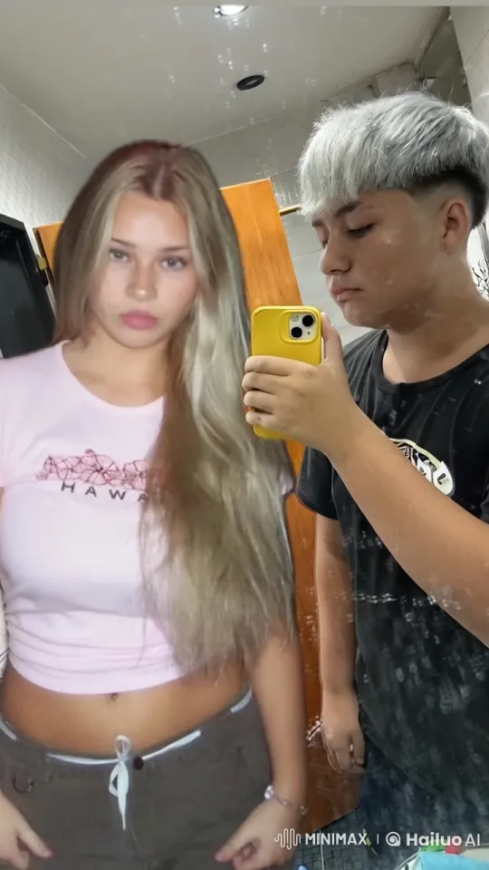 Couple Sharing Intimate Moment in Mirror Selfie – AI Generated Video | Hailuo AI