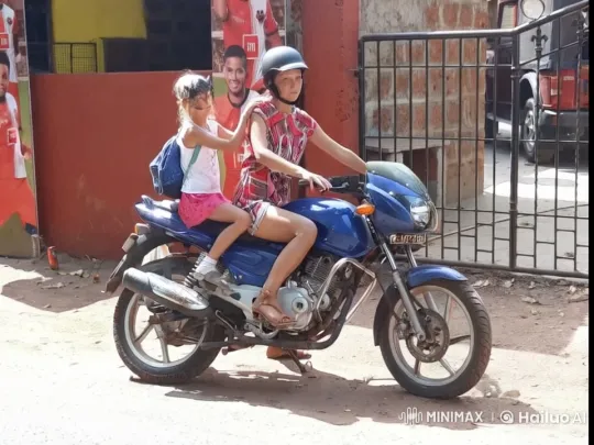 Woman and Girl Prepare to Depart on Motorbike – AI Generated Video | Hailuo AI